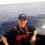 Jeff Morrison '04 on the bridge of USS HELENA